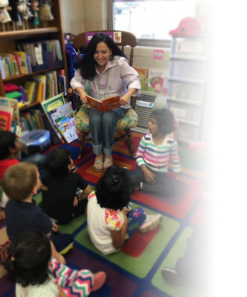 Nancy reading to school children